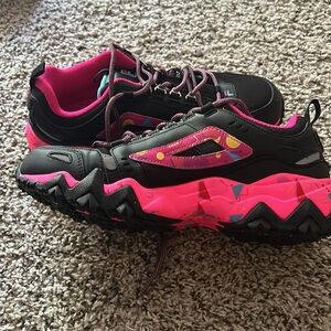 Black and pink Filas